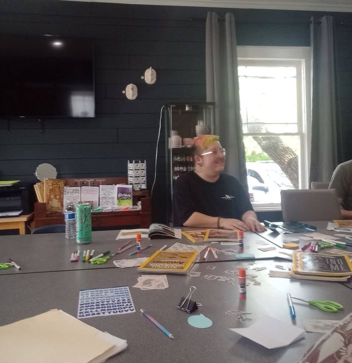 Me in the classroom of Denton Maker Center teaching zines.